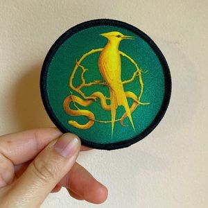 NWT Hunger Games Ballad of Songbirds and Snakes limited edition green gold patch